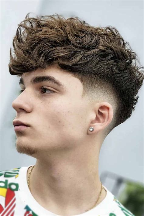 fluffy hair boy haircut|haircuts for boys fluffy top.